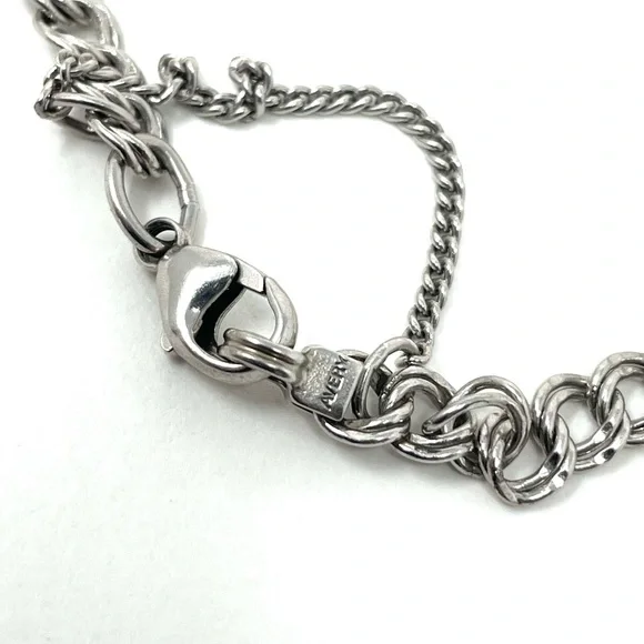 JAMES AVERY sterling silver charm bracelet, 8 charms Bracelets